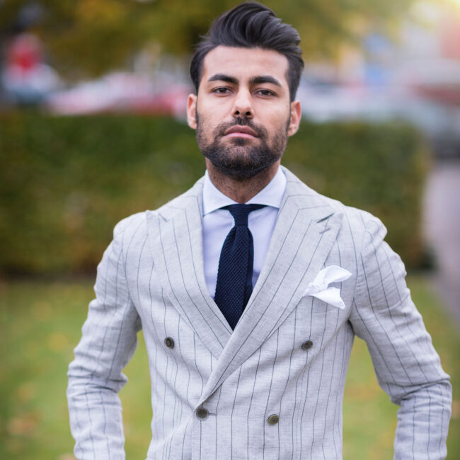 Gentleman standing in suit