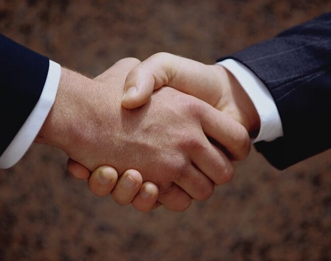 business men shaking hands