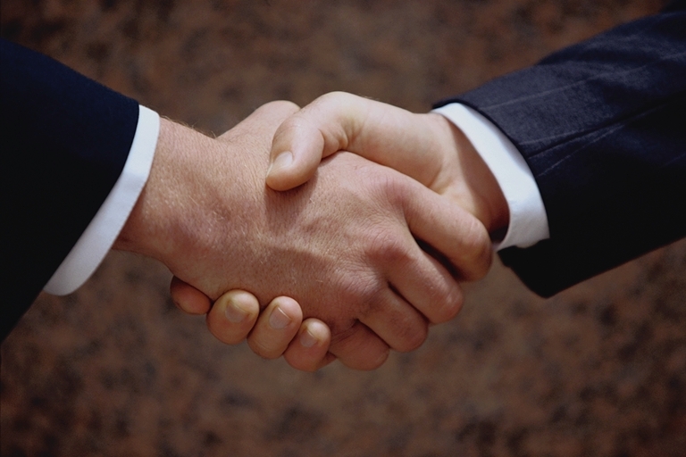 business men shaking hands